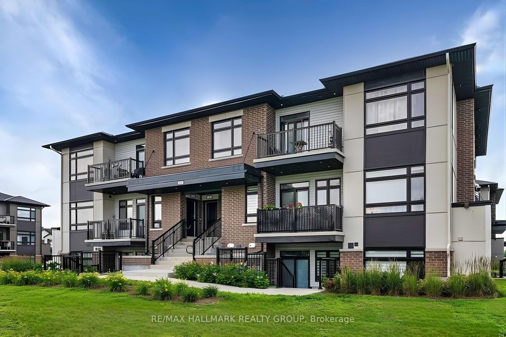 Photo of 300 Tulum Crescent #i, Kanata, ON K2S 2Y4 (MLS # X13022586)
