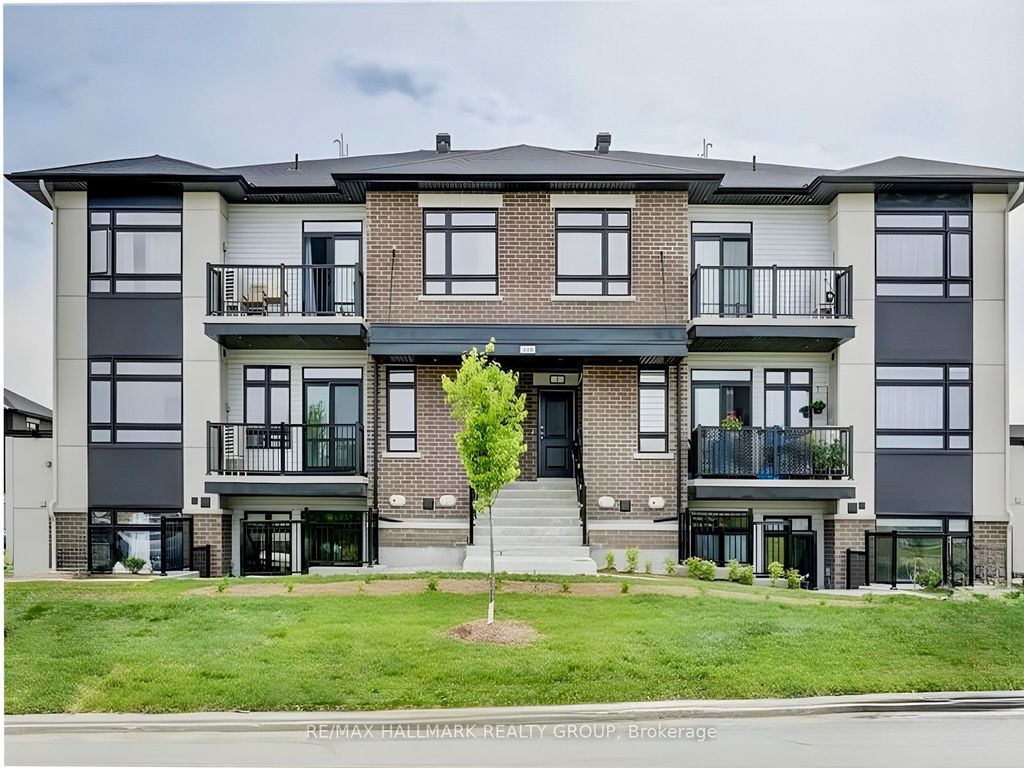 Photo of 300 Tulum Crescent #i, Kanata, ON K2S 2Y4 (MLS # X13022586)
