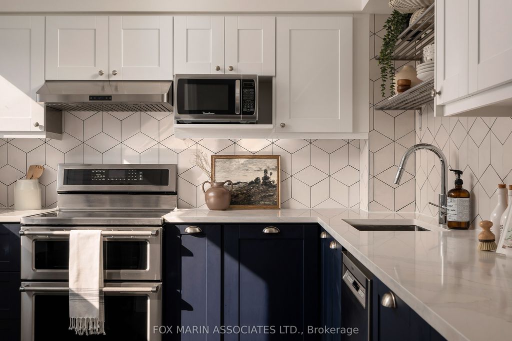 Photo of 90 Edgewood Avenue #130, Toronto, ON M4L 3H1 (MLS # E12418801)