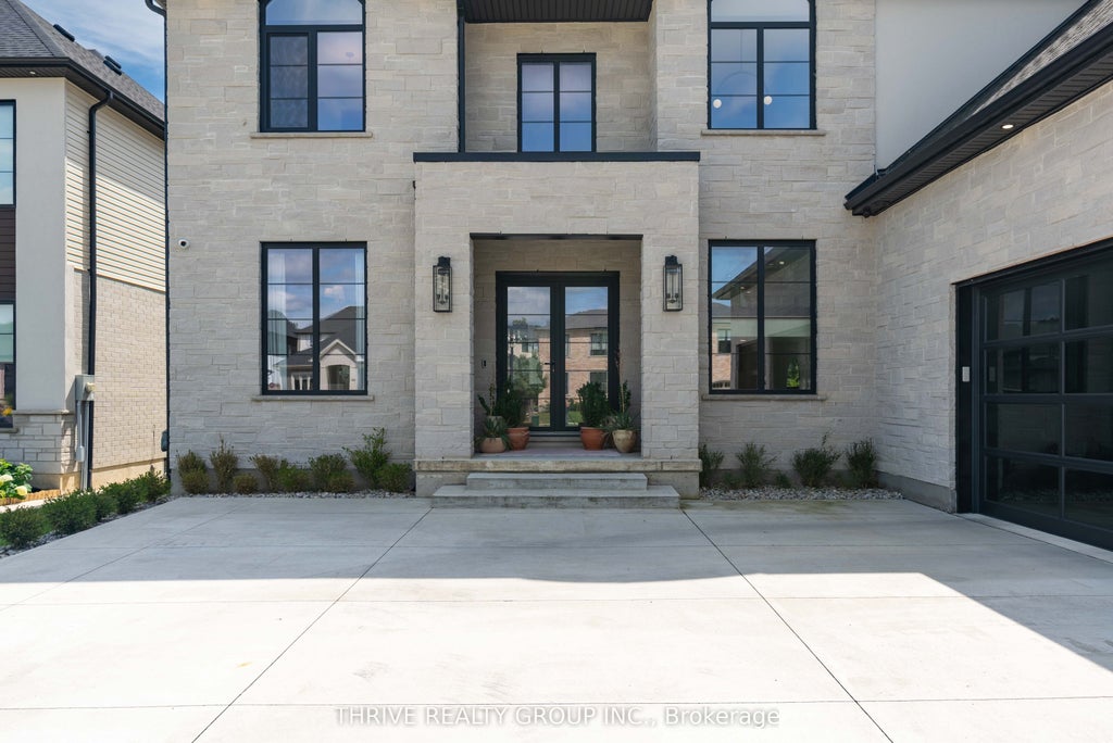 Photo of 365 MANHATTAN Drive, London South, ON N6K 0L5 (MLS # X13717022)