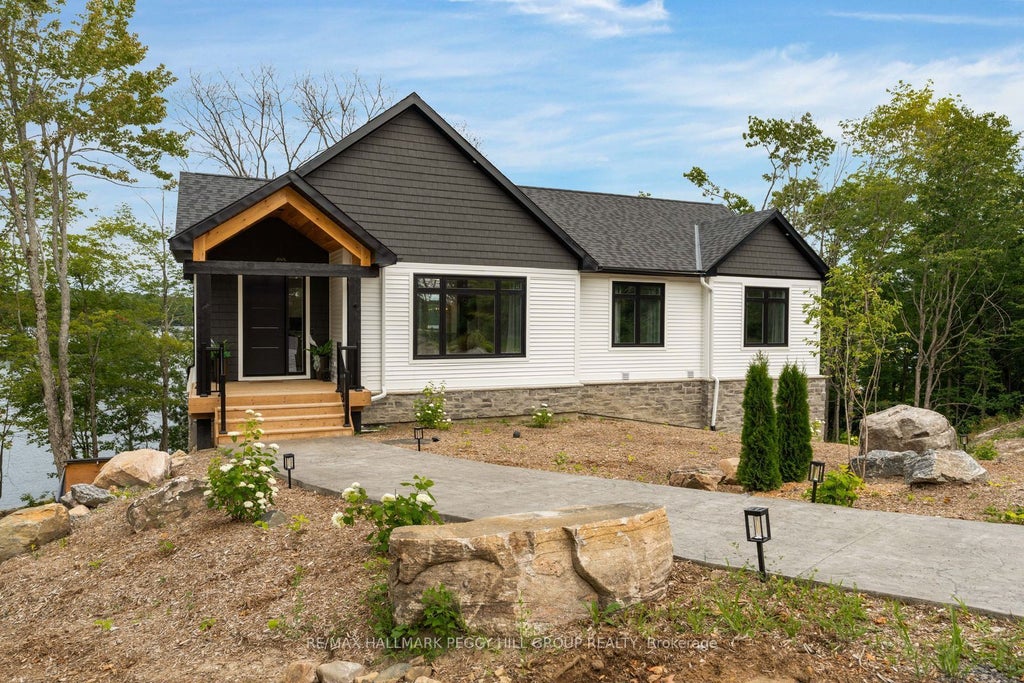 Photo of 20 Hawkins Point Road, Georgian Bay, ON P0C 1H0 (MLS # X13810238)