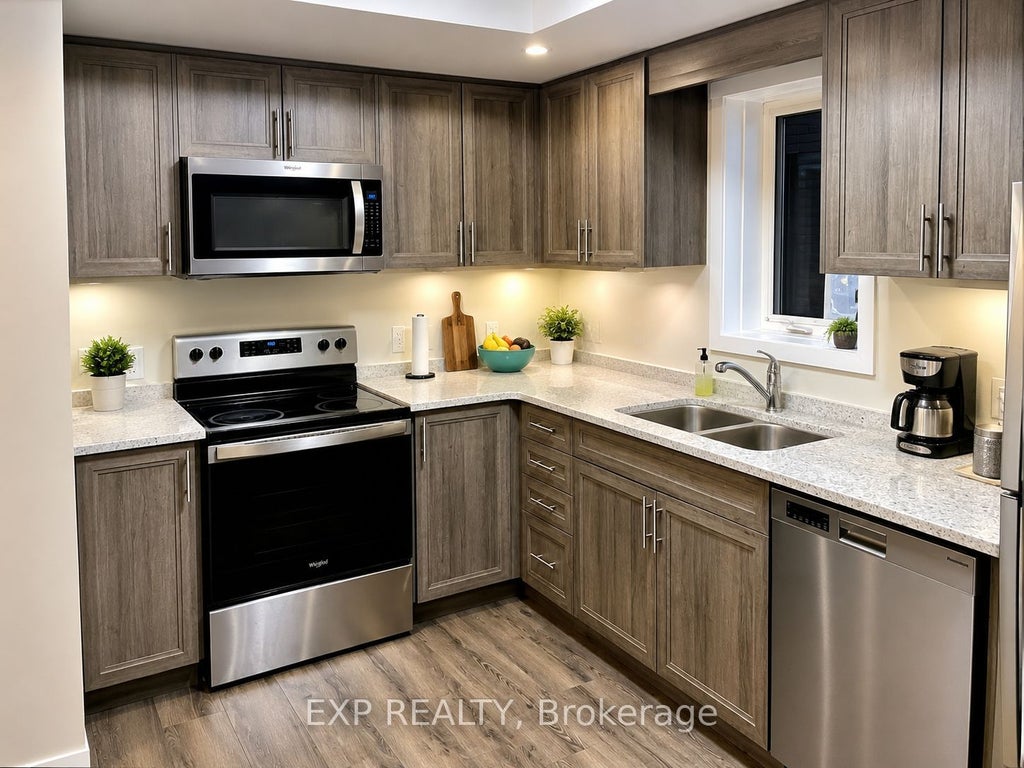 Photo of 160 ROCHEFORT Street #C14, Kitchener, ON N2R 0P5 (MLS # X13841144)