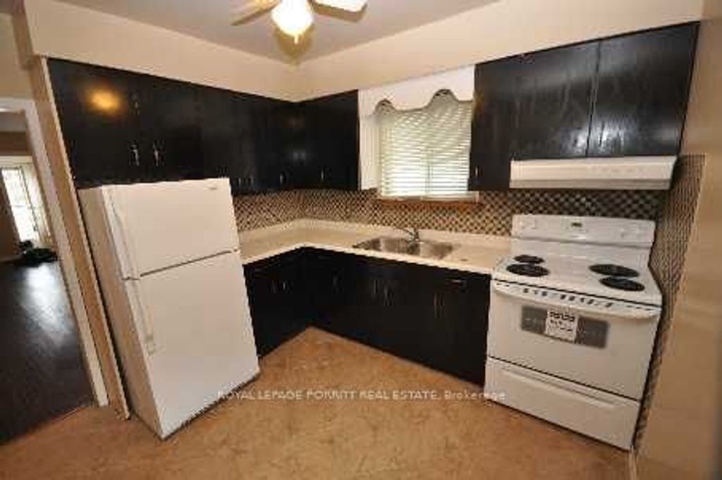 Photo of 86 Ash Crescent, Toronto, ON M8W 1E6 (MLS # W13048154)