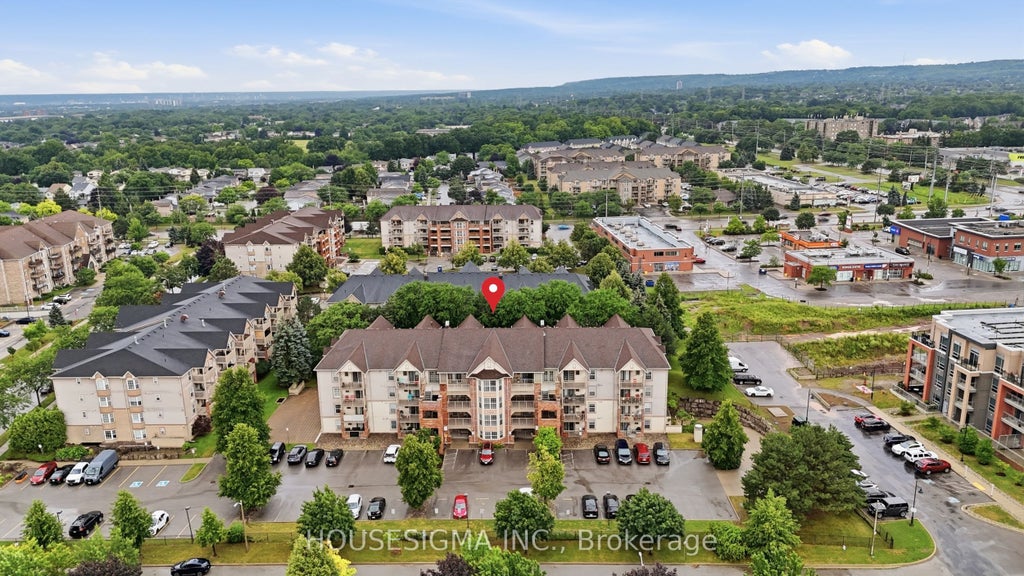 Photo of 4025 Kilmer Drive #203, Burlington, ON L7M 4M5 (MLS # W13585764)