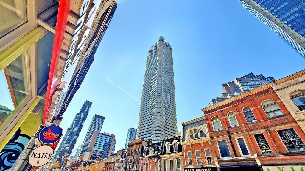 Photo of 11 Wellesley Street W #2502, Toronto, ON M4Y 1E8 (MLS # C13607048)