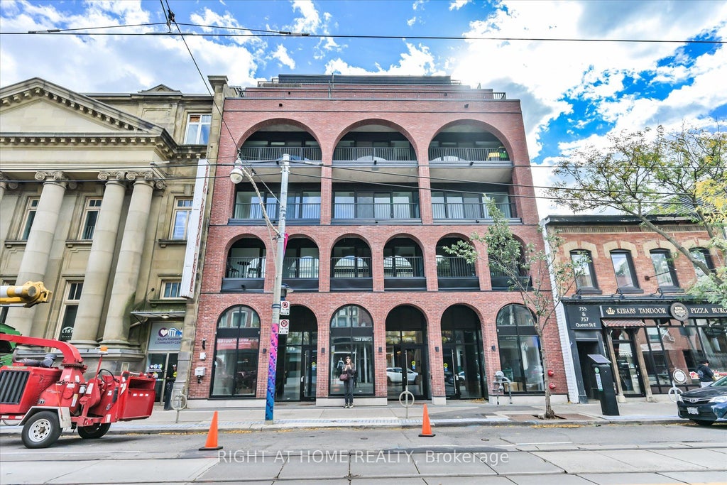 Photo of 761 Queen Street E #404, Toronto, ON M4M 1H3 (MLS # E13933826)