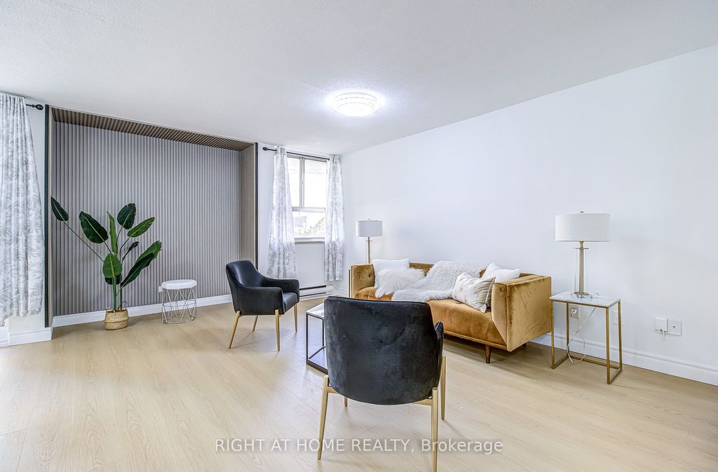 Photo of 8 Crescent Town Road #409, Toronto, ON M4C 5L3 (MLS # E13119648)