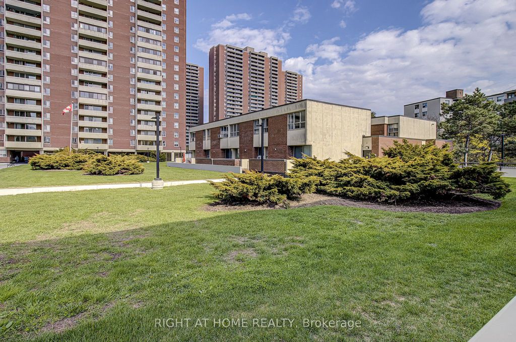 Photo of 8 Crescent Town Road #409, Toronto, ON M4C 5L3 (MLS # E13119648)