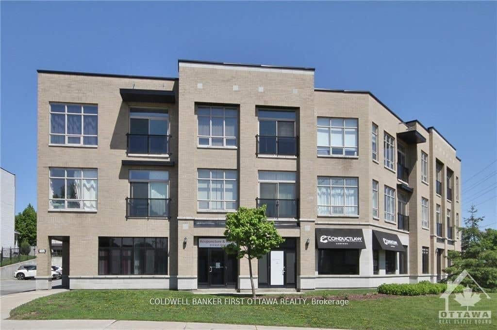 Photo of 500 CLARIDGE Drive #205, Barrhaven, ON K2J 3G5 (MLS # X13665234)