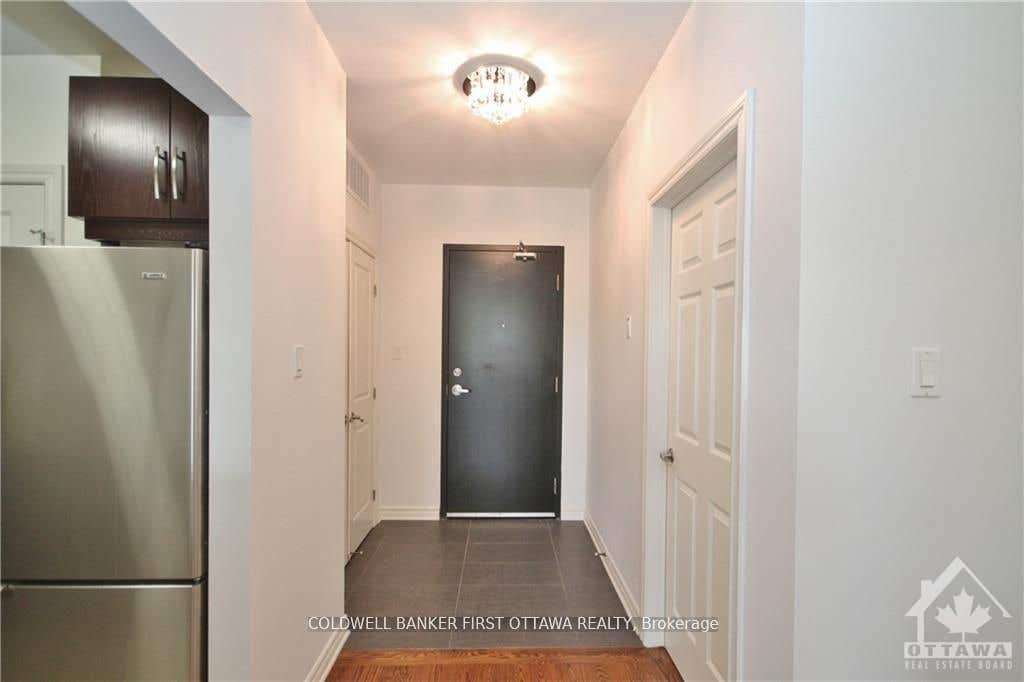 Photo of 500 CLARIDGE Drive #205, Barrhaven, ON K2J 3G5 (MLS # X13665234)