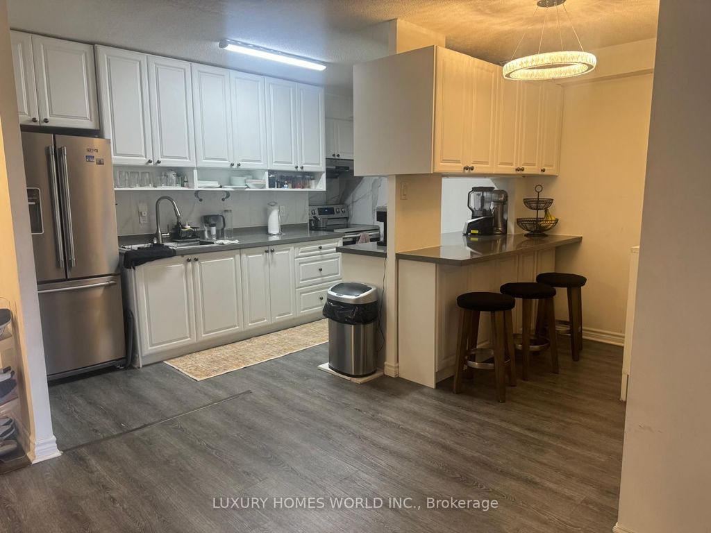 Photo of 15 Torrance Road #107, Toronto, ON M1J 3K2 (MLS # E12404417)