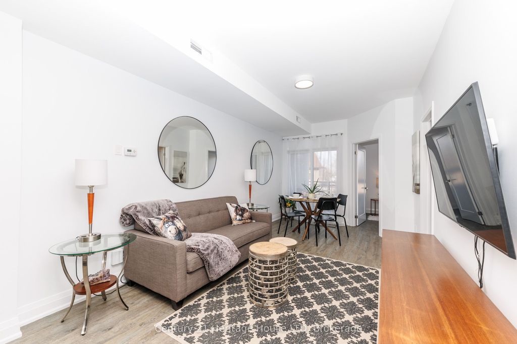 Photo of 39 Robinson Street N #8, Grimsby, ON L3M 3C9 (MLS # X12823066)