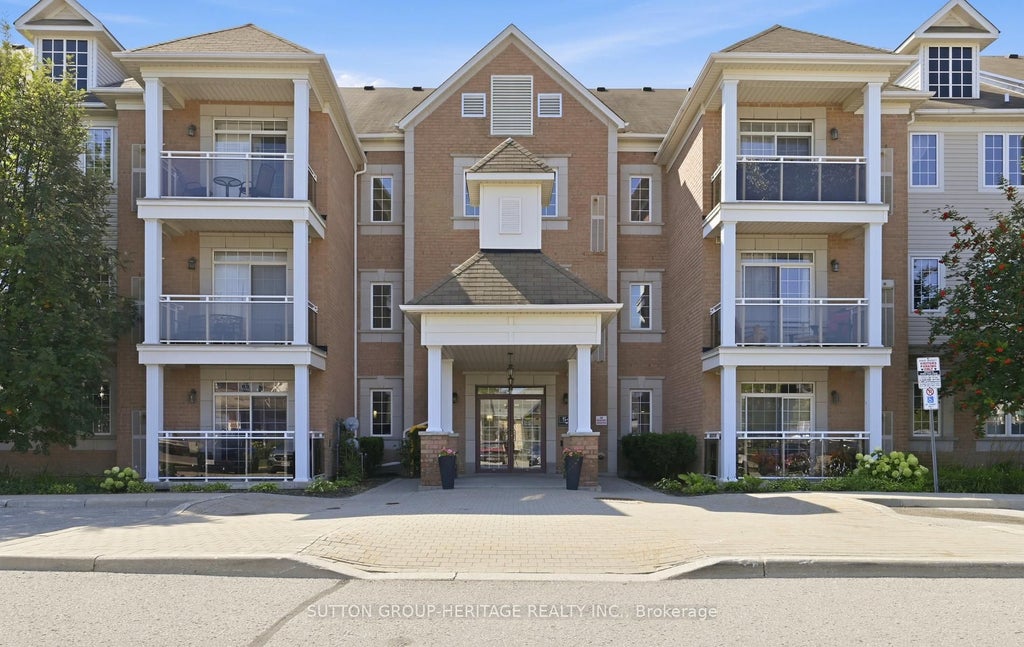 Photo of 54 Harvey Johnston Way #320, Whitby, ON L1M 0J7 (MLS # E14013028)