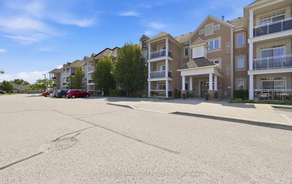 Photo of 54 Harvey Johnston Way #320, Whitby, ON L1M 0J7 (MLS # E14013028)