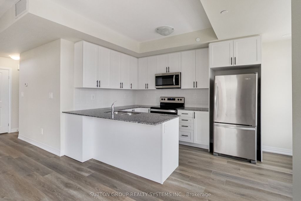 Photo of 1593 Rose Way #102, Milton, ON L9E 0J2 (MLS # W12697614)