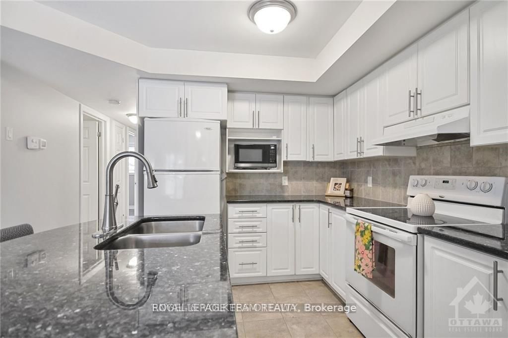 Photo of 46 Barnstone Drive #2, Barrhaven, ON K2G 4R6 (MLS # X12981528)