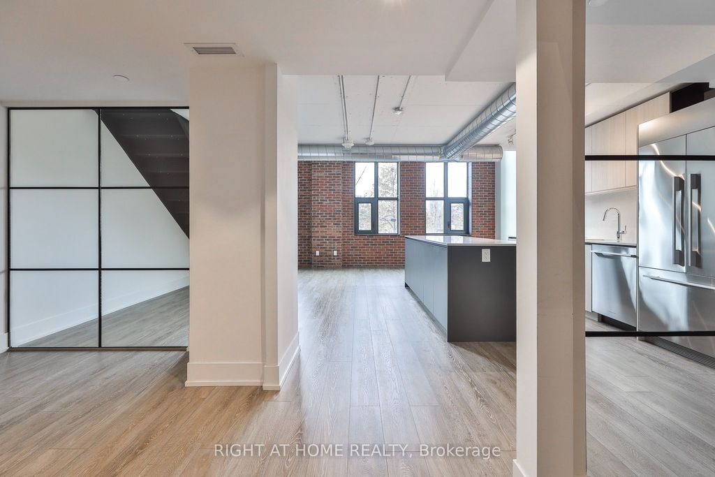 Photo of 150 Logan Avenue #409, Toronto, ON M4M 0E4 (MLS # E12376306)