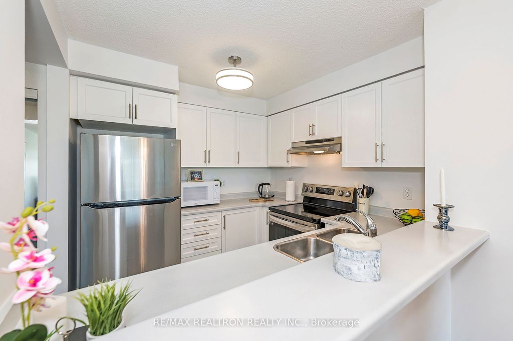 Photo of 2155 Burnhamthorpe Road W #1301, Mississauga, ON L5L 5P4 (MLS # W12654204)