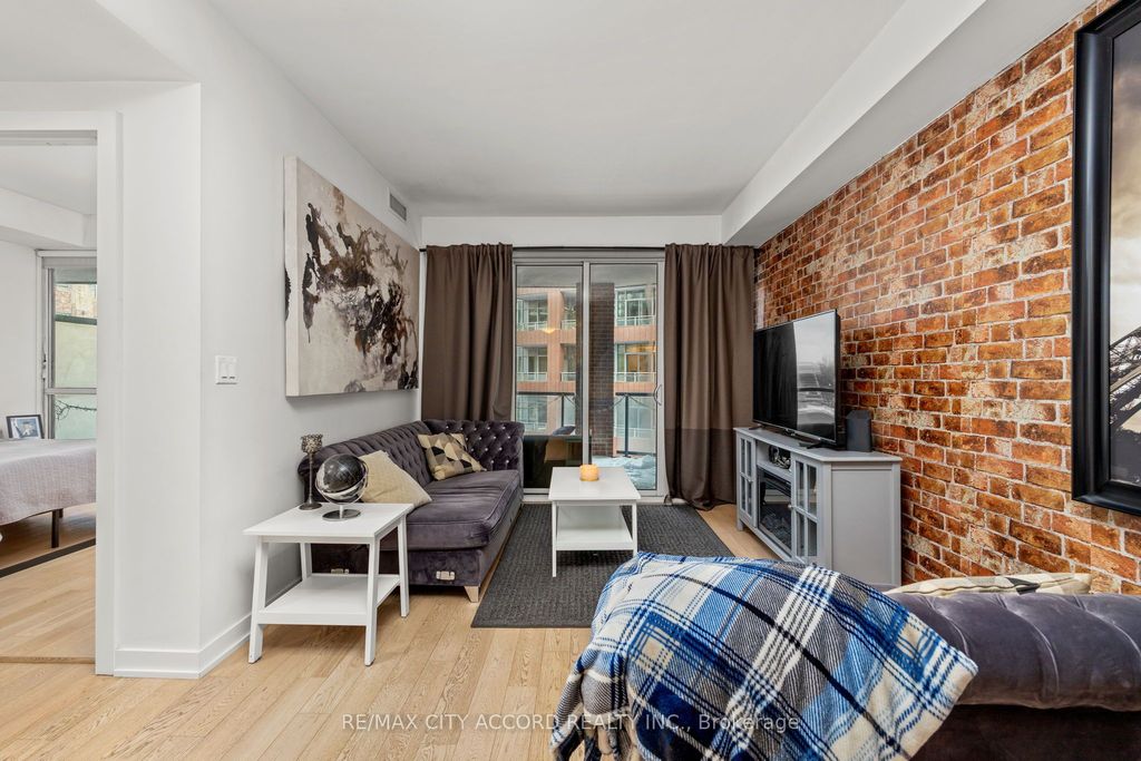 Photo of 20 Bruyeres Mews #311, Toronto, ON M5V 0G8 (MLS # C13116298)