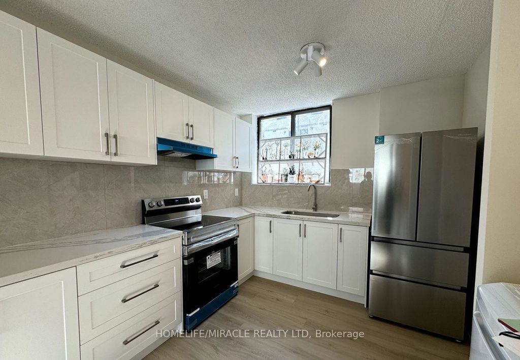 Photo of 665 Kennedy Road #303, Toronto, ON M1K 5E2 (MLS # E12727728)