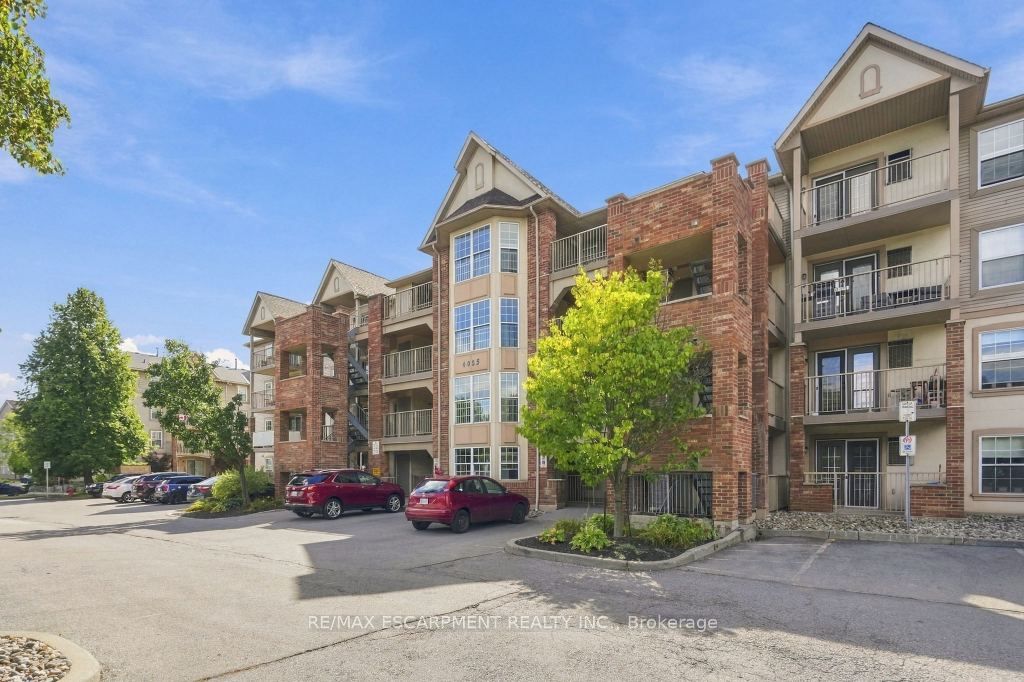 Photo of 4025 KILMER Drive #310, Burlington, ON L7M 4M5 (MLS # W13825068)
