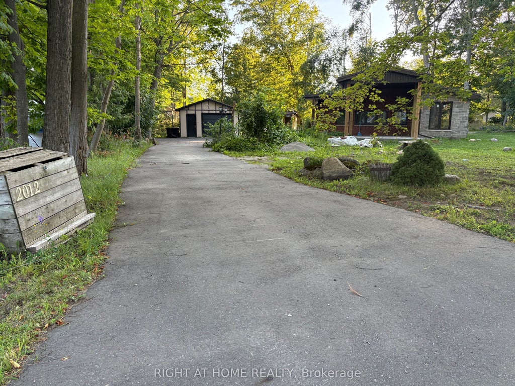 Photo of 2012 Inglewood Drive, Innisfil, ON L9S 1Z1 (MLS # N13750296)