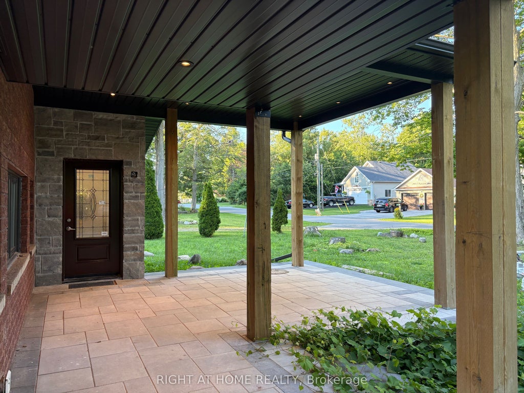 Photo of 2012 Inglewood Drive, Innisfil, ON L9S 1Z1 (MLS # N13750296)