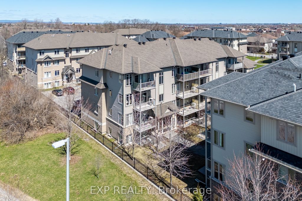 Photo of 67 Tipperary Private N/A #E, Barrhaven, ON K2J 2T3 (MLS # X13043462)