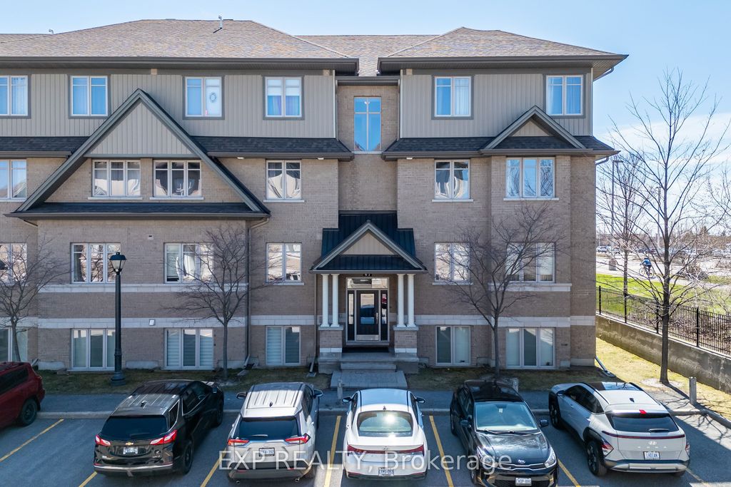 Photo of 67 Tipperary Private N/A #E, Barrhaven, ON K2J 2T3 (MLS # X13043462)