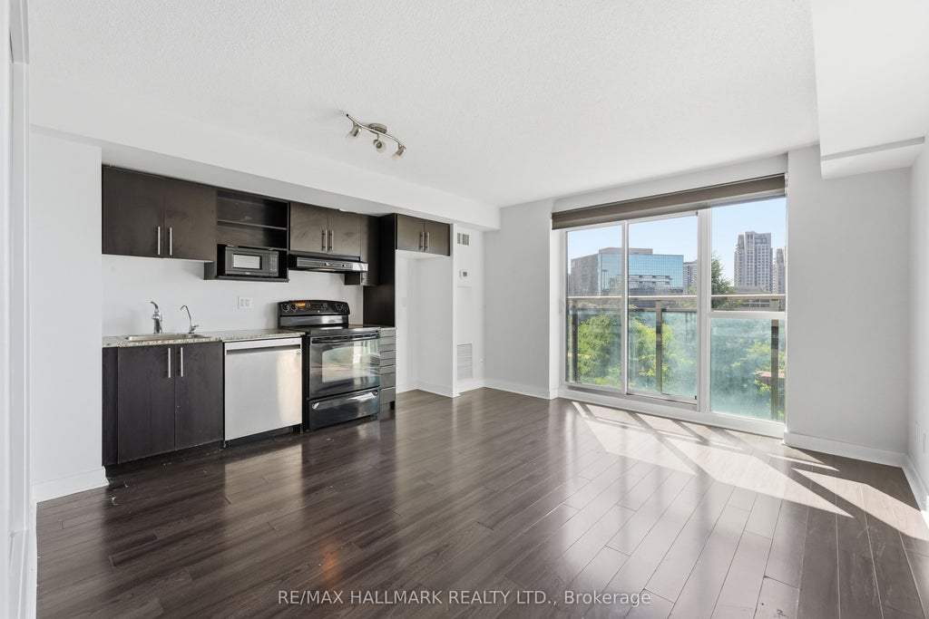Photo of 120 Dallimore Circle #417, Toronto, ON M3C 4J1 (MLS # C13828386)