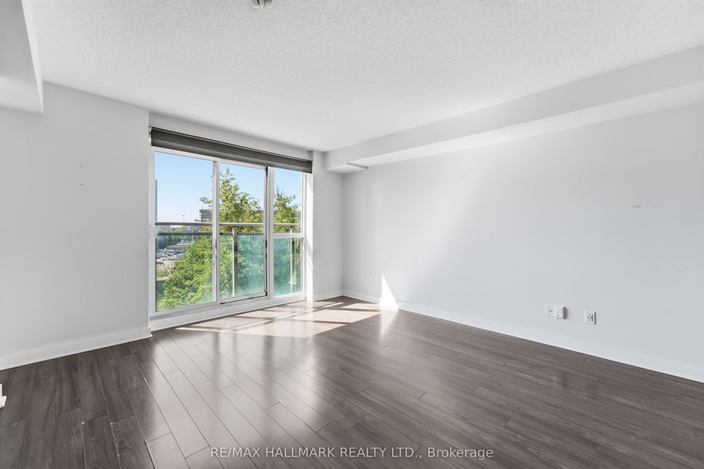 Photo of 120 Dallimore Circle #417, Toronto, ON M3C 4J1 (MLS # C13479496)
