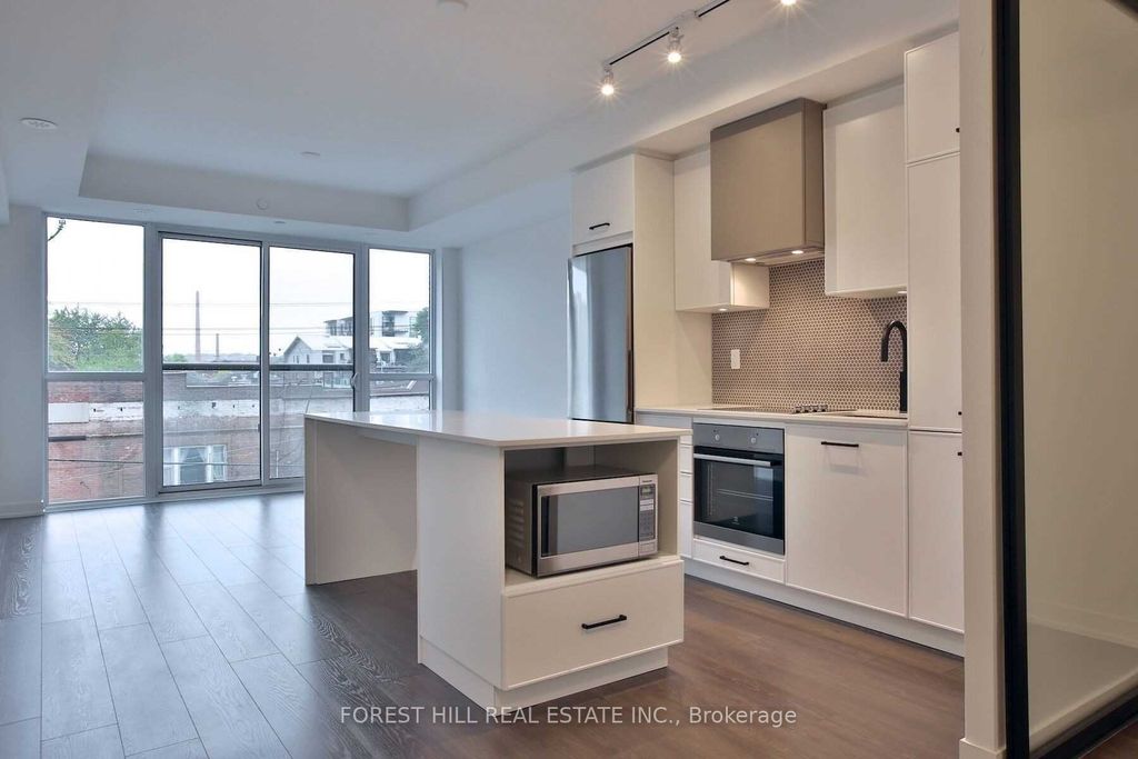 Photo of 899 Queen Street E #402, Toronto, ON M4M 1J4 (MLS # E12357367)