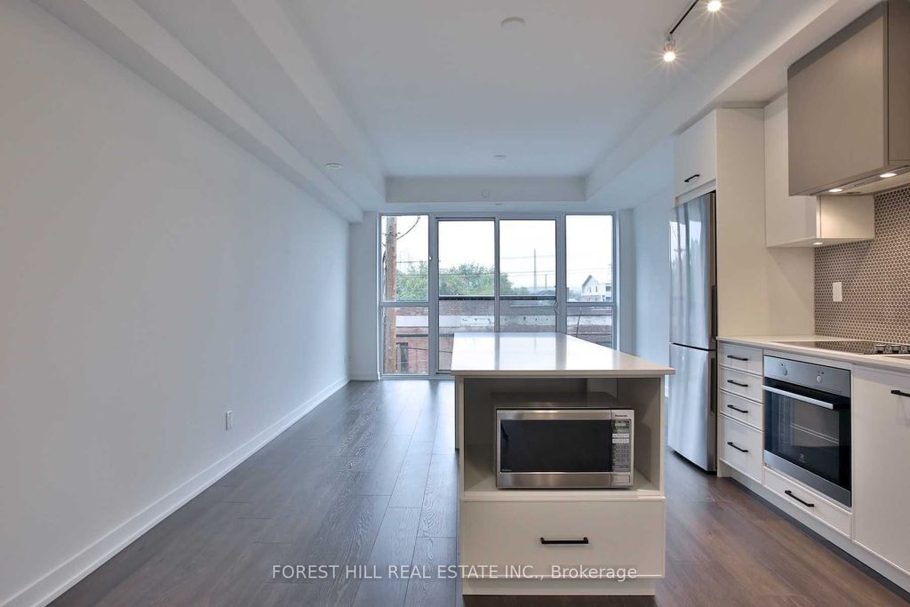 Photo of 899 Queen Street E #402, Toronto, ON M4M 1J4 (MLS # E12357367)