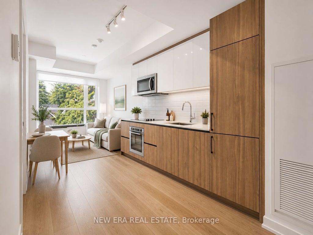 Photo of 150 Logan Avenue #301, Toronto, ON M4M 0E4 (MLS # E13520348)