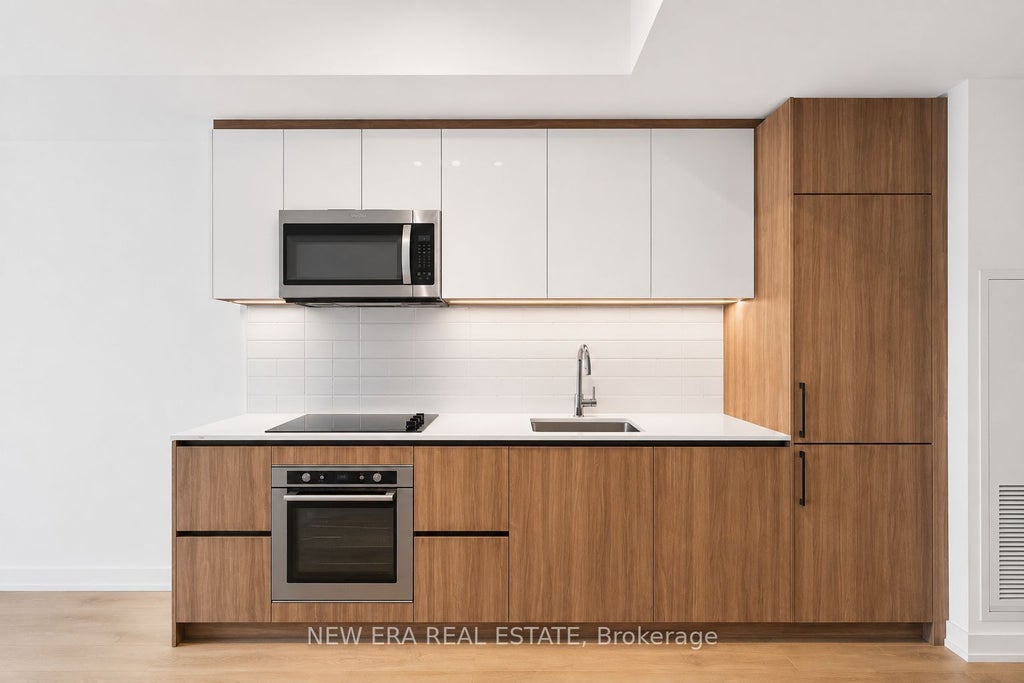 Photo of 150 Logan Avenue #301, Toronto, ON M4M 0E4 (MLS # E13520348)