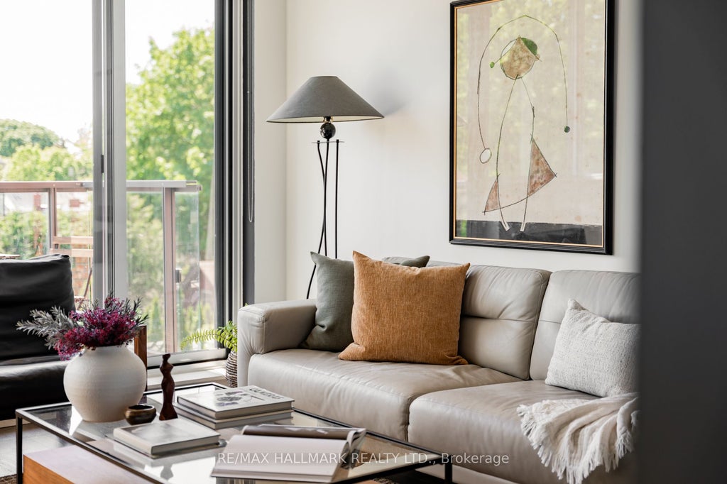Photo of 60 Haslett Avenue #201, Toronto, ON M4L 0A9 (MLS # E13248498)
