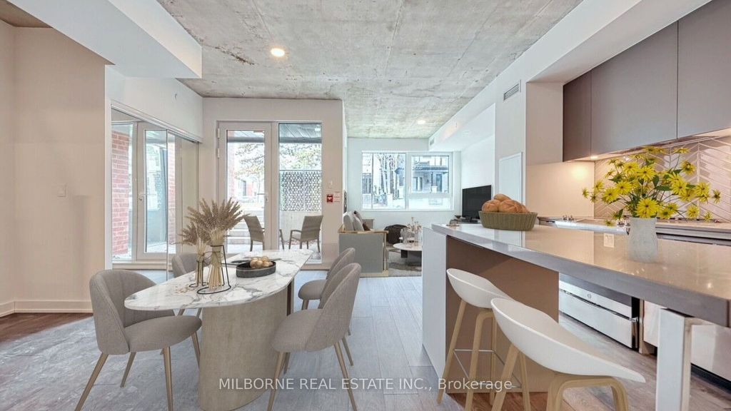 Photo of 57 Brock Avenue #TH 103, Toronto, ON M3H 3N2 (MLS # W13038670)