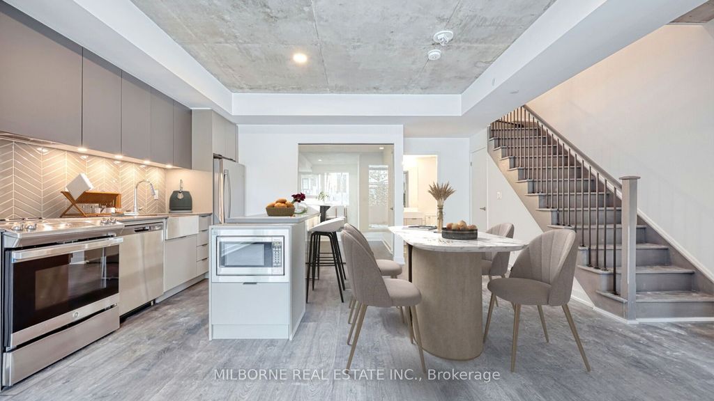 Photo of 57 Brock Avenue #TH 103, Toronto, ON M3H 3N2 (MLS # W13038670)