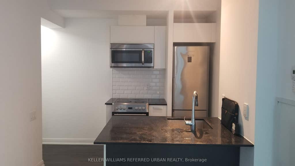 Photo of 42 Charles Street E #409, Toronto, ON M4Y 1T4 (MLS # C13625316)