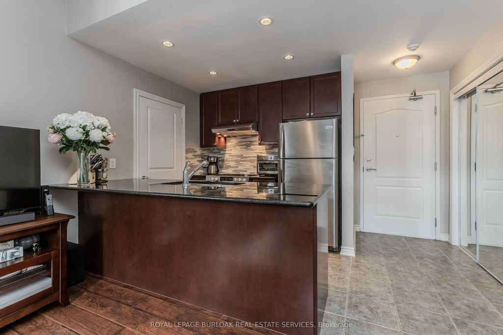 Photo of 5327 Upper Middle Road #205, Burlington, ON L7L 0E9 (MLS # W13172624)