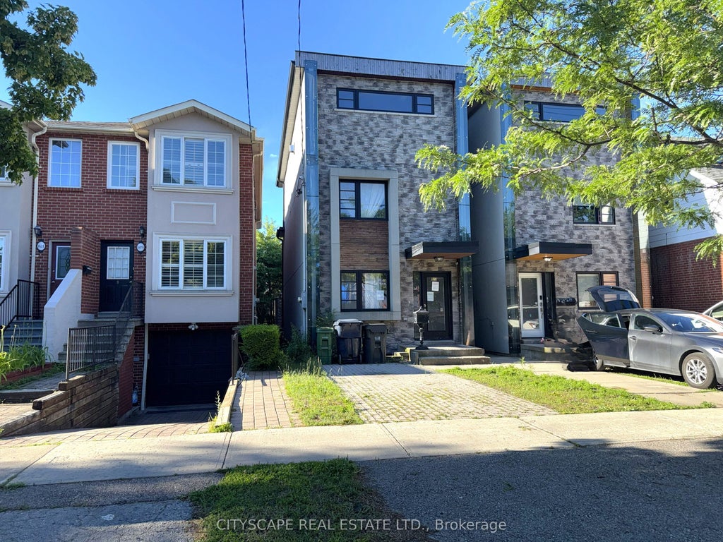 Photo of 817 Cosburn Avenue, Toronto, ON M4C 2V9 (MLS # E13492272)