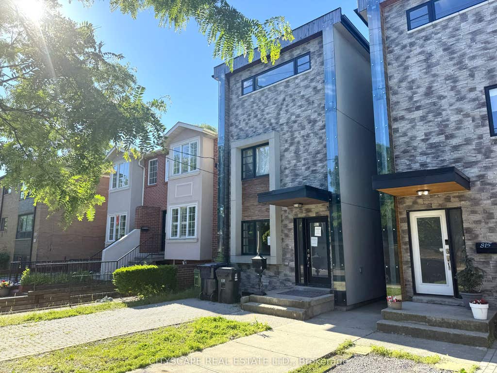 Photo of 817 Cosburn Avenue, Toronto, ON M4C 2V9 (MLS # E13492272)