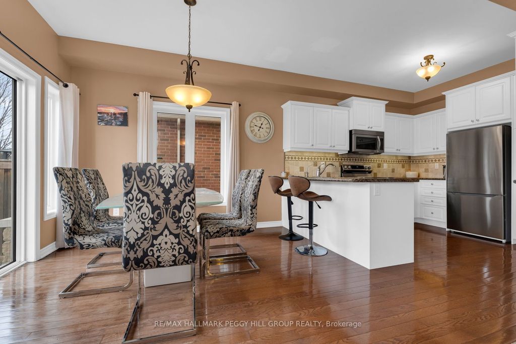 Photo of 298 Greenwood Drive, Essa, ON L3W 0E8 (MLS # N13112128)