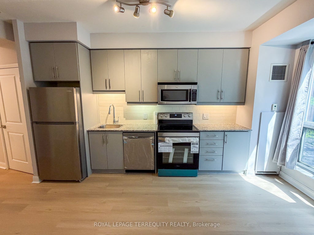 Photo of 1 Scott Street #311, Toronto, ON M5E 1A1 (MLS # C13802480)
