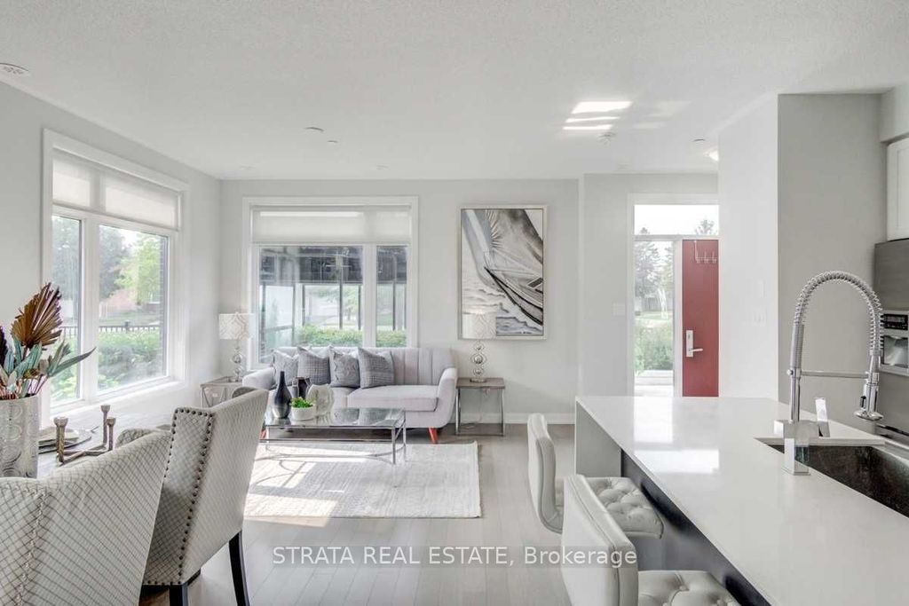 Photo of 4070 Parkside Village Drive #Th 12, Mississauga, ON L5B 0K2 (MLS # W12589012)