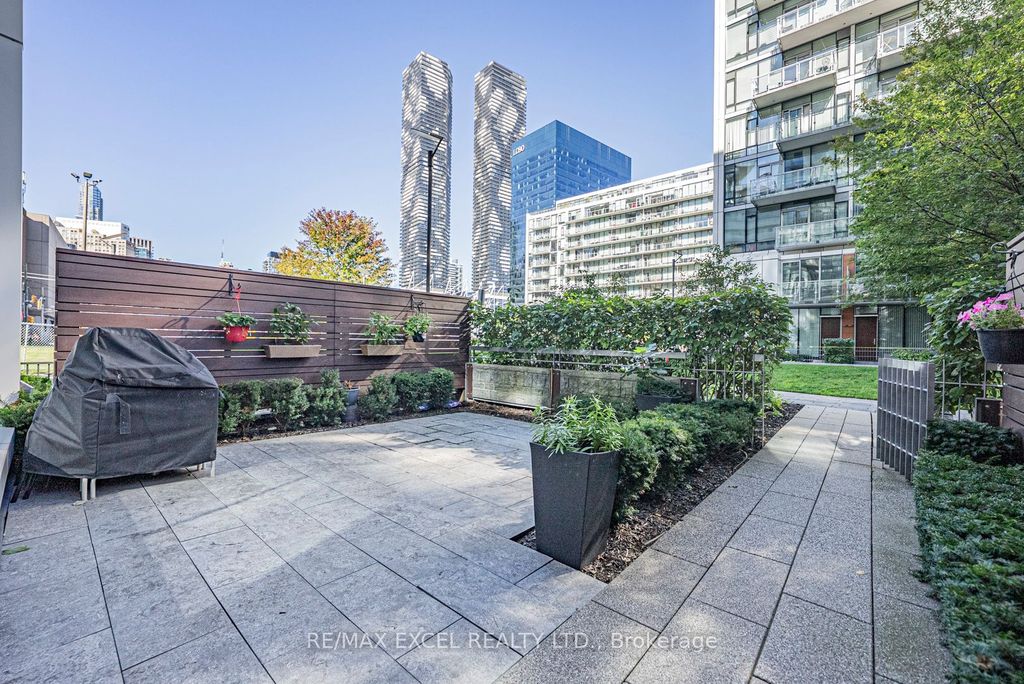 Photo of 29 Queens Quay E #Th127, Toronto, ON M5E 0A4 (MLS # C12430466)