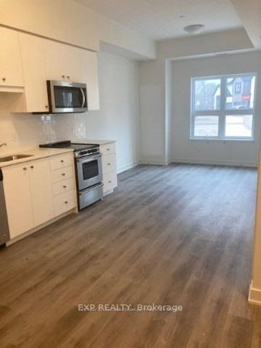 Photo of 110 Fergus Avenue #101, Kitchener, ON N2A 2H2 (MLS # X13054250)