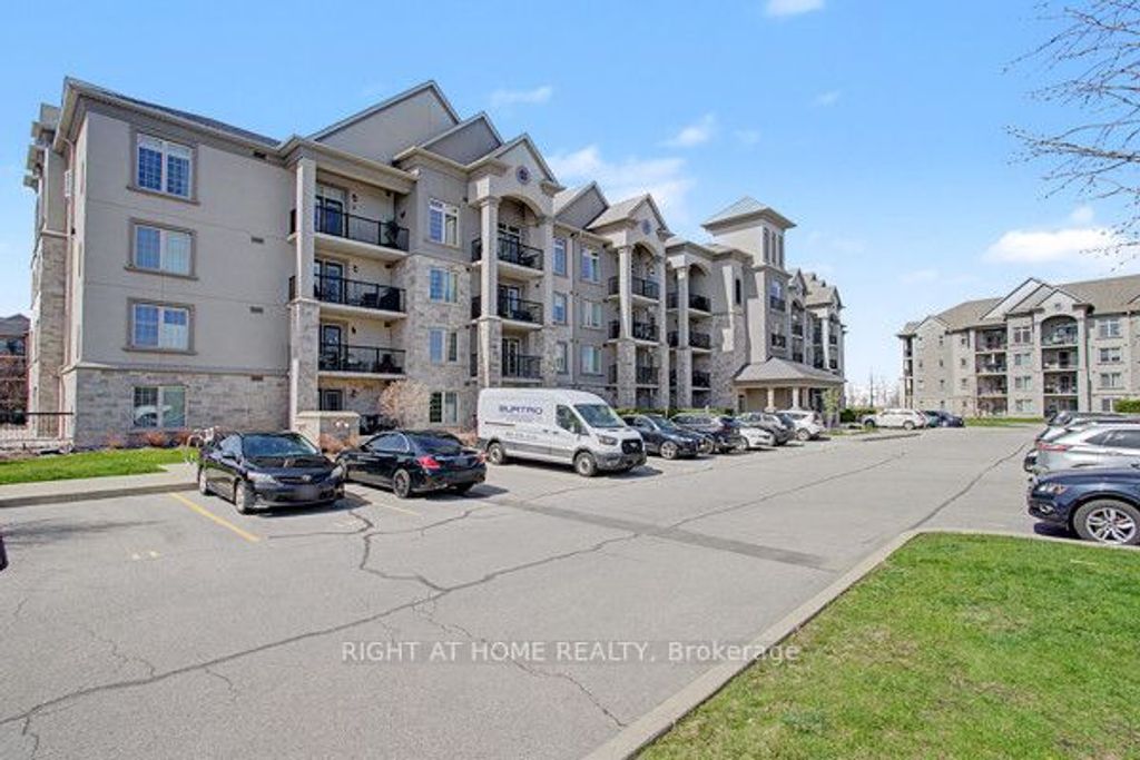 Photo of 1460 Main Street E #404, Milton, ON L9T 8W5 (MLS # W13061054)