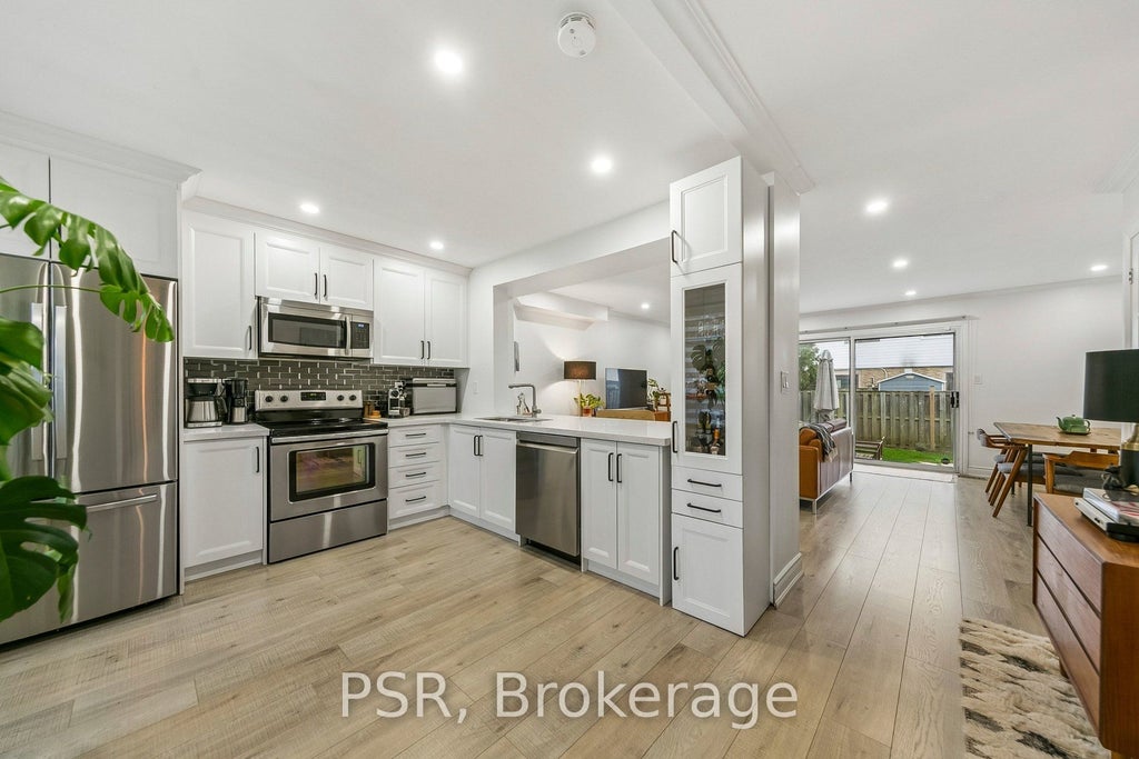 Photo of 6540 Falconer Drive #104, Mississauga, ON L5N 1M1 (MLS # W13631842)