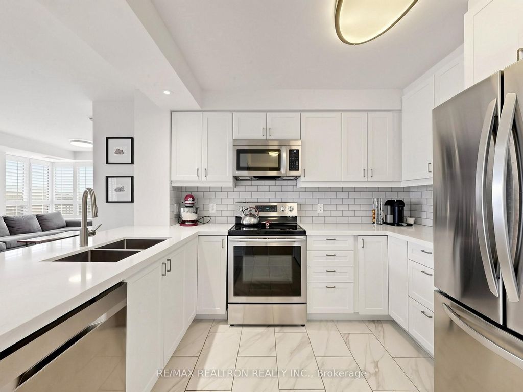 Photo of 16 Dallimore Circle #414, Toronto, ON M3C 4C4 (MLS # C13093624)